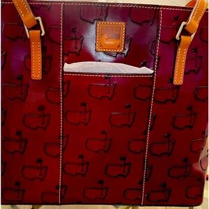 Dooney & Bourke handbag with Master’s emblem.  11 1/2” by 14”.